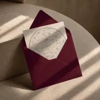 Custom star map printed as a greeting card, tucked into a burgundy envelope